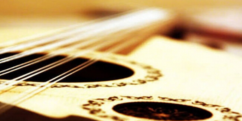 Step-by-step guide to restringing a traditional oud lute instrument