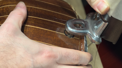 Transforming a Cumbus String Instrument into a Tanbur Bowed Instrument