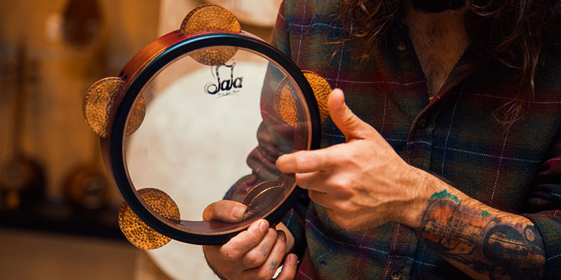Arabic riq tambourine with brass jingle pairs used in classical takht ensembles